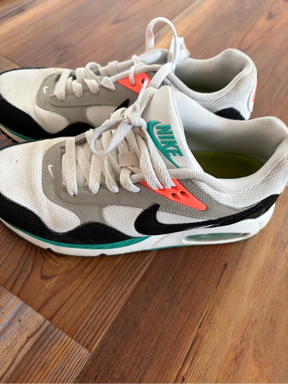 Nike women’s White, Black & Teal Accent Sneakers with Coral Detail Nike air
